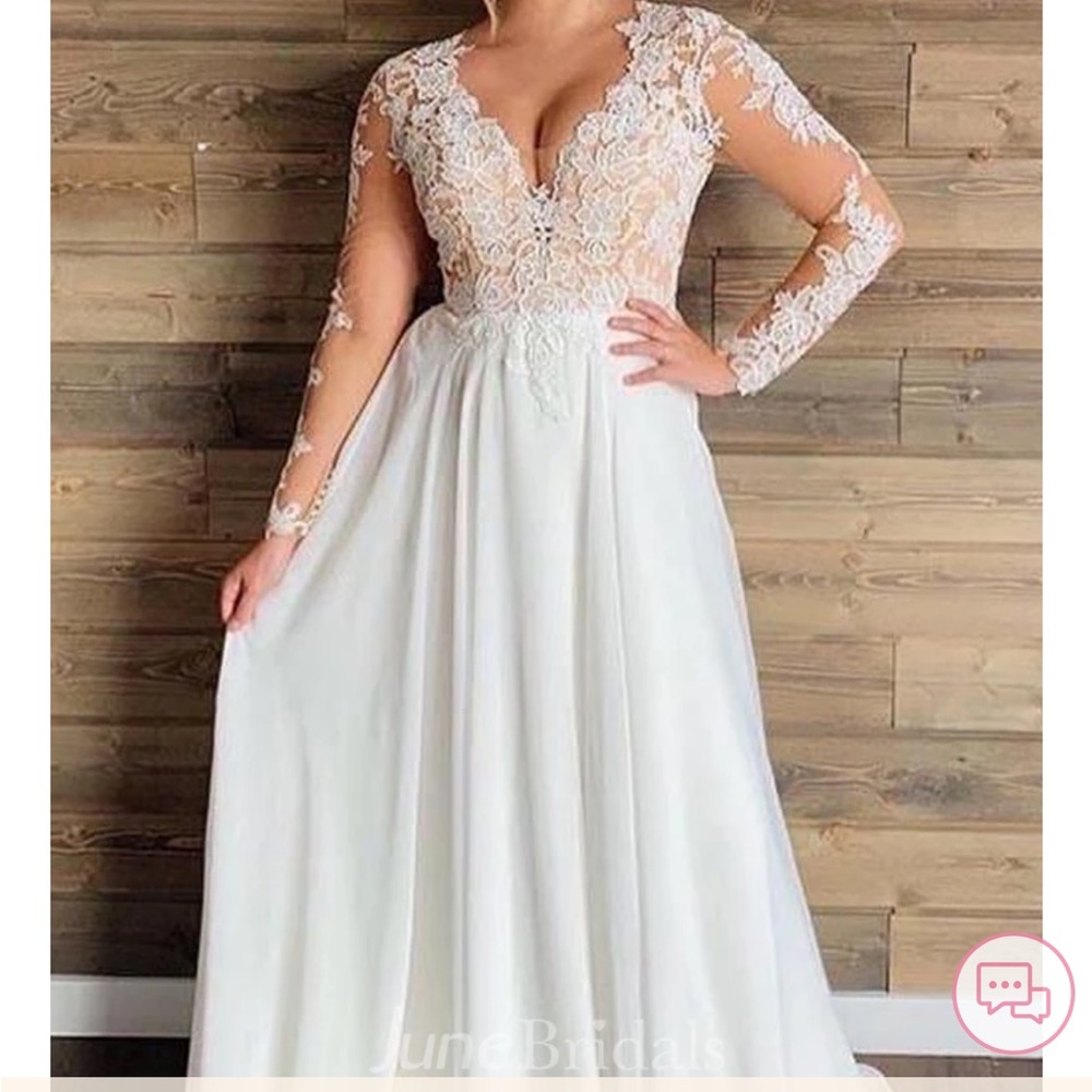 Size 24W brand new with tags wedding dress from June Bridals